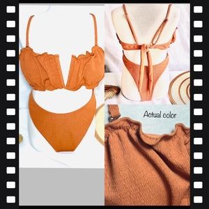 Women’s bikini with adjustable straps. New. Size M.